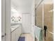 Bathroom with double vanity and a walk-in shower at 623 Margaritaville Ave, Daytona Beach, FL 32124