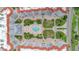 Aerial view of community pool and surrounding courtyard at 1 John Anderson Dr # 1070, Ormond Beach, FL 32176