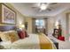 Main bedroom with large bed, nightstands, and window coverings at 1 John Anderson Dr # 1070, Ormond Beach, FL 32176
