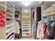Large walk-in closet with ample shelving and hanging space at 1 John Anderson Dr # 1070, Ormond Beach, FL 32176