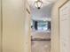 View into a bedroom with a bed and access to a balcony at 1 John Anderson Dr # 1070, Ormond Beach, FL 32176