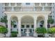 Elegant building entrance with columns and fountain at 1 John Anderson Dr # 1070, Ormond Beach, FL 32176