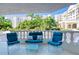 Relaxing patio with comfy seating and views of lush landscaping at 1 John Anderson Dr # 1070, Ormond Beach, FL 32176