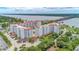 Aerial view of building near river and bridge at 1 John Anderson Dr # 1070, Ormond Beach, FL 32176