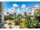 Stunning view of waterfront property with lush landscaping and palm trees at 1 John Anderson Dr # 1070, Ormond Beach, FL 32176