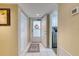 Condo entryway with coat closet and access to laundry and other rooms at 1 John Anderson Dr # 1070, Ormond Beach, FL 32176