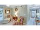 Spacious living room with comfortable seating and access to a balcony at 1 John Anderson Dr # 1070, Ormond Beach, FL 32176