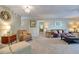 Comfortable living room with seating and view to bedroom at 1 John Anderson Dr # 1070, Ormond Beach, FL 32176