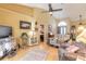 Bright living room with vaulted ceilings, hardwood floors, and comfy seating at 3836 Long Grove Ln, Port Orange, FL 32129