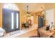 Bright dining area with hardwood floors and access to the kitchen at 3836 Long Grove Ln, Port Orange, FL 32129