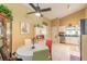 Eat-in kitchen with stainless steel appliances and ample cabinet space at 3836 Long Grove Ln, Port Orange, FL 32129