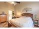 Primary bedroom with a king-size bed and walk-in closet at 3836 Long Grove Ln, Port Orange, FL 32129
