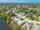 Aerial view of houses near a lake at 3836 Long Grove Ln, Port Orange, FL 32129