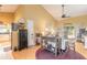 Spacious living area featuring hardwood floors and access to the backyard at 3836 Long Grove Ln, Port Orange, FL 32129