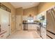Modern kitchen boasting stainless steel appliances and granite countertops at 3836 Long Grove Ln, Port Orange, FL 32129