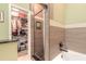 Bathroom with walk-in closet, soaking tub, and shower at 3836 Long Grove Ln, Port Orange, FL 32129
