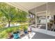 Relaxing screened patio overlooking a serene lake at 3836 Long Grove Ln, Port Orange, FL 32129