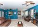 Open living room with a view into the kitchen and dining area at 399 Foxhill Dr, Debary, FL 32713