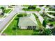 Aerial view of single-Gathering home with tile roof in a residential neighborhood at 399 Foxhill Dr, Debary, FL 32713