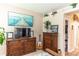 Bedroom with wooden dresser and a large flat screen TV at 399 Foxhill Dr, Debary, FL 32713