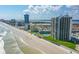 Aerial view of beachfront high-rise condos with pools and ocean views at 2555 S Atlantic Ave # 207, Daytona Beach Shores, FL 32118