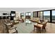 Spacious living room with ocean view and wicker furniture at 2555 S Atlantic Ave # 207, Daytona Beach Shores, FL 32118