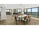 Elegant dining room with ocean views and large windows at 2555 S Atlantic Ave # 207, Daytona Beach Shores, FL 32118