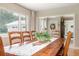 Farmhouse-style dining room with a rustic wooden table at 2210 E New York Ave, Deland, FL 32724