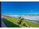 Balcony with partial ocean view at 2301 S Atlantic Ave # 236, Daytona Beach Shores, FL 32118