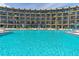Large, refreshing pool with plenty of lounge chairs for sunbathing at 2301 S Atlantic Ave # 236, Daytona Beach Shores, FL 32118