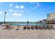 Relaxing pool area with ocean views and lounge chairs at 2301 S Atlantic Ave # 236, Daytona Beach Shores, FL 32118