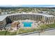 Aerial view of oceanfront building with pool at 2301 S Atlantic Ave # 236, Daytona Beach Shores, FL 32118