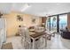 Bright dining area with ocean view and seating for four at 2301 S Atlantic Ave # 306, Daytona Beach Shores, FL 32118