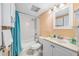 Clean bathroom with tub shower combo and vanity at 2301 S Atlantic Ave # 306, Daytona Beach Shores, FL 32118