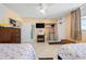 Bright bedroom with two twin beds and access to bathroom at 2301 S Atlantic Ave # 306, Daytona Beach Shores, FL 32118