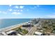 Aerial view showcasing oceanfront location and building at 2301 S Atlantic Ave # 306, Daytona Beach Shores, FL 32118
