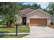 Image 1 of 23: 537 Champion Ridge Dr, Daytona Beach