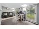 Bright home office featuring a comfortable couch and large windows at 246 Angeles Rd, Debary, FL 32713