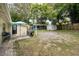 Backyard view showcasing patio, grill, and shed at 246 Angeles Rd, Debary, FL 32713