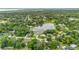 Aerial view of house near a lake at 246 Angeles Rd, Debary, FL 32713