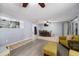 Bright living room with wood-look floors, and a view into the dining area at 246 Angeles Rd, Debary, FL 32713
