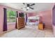 Bedroom with bunk bed, dresser, and ceiling fan at 246 Angeles Rd, Debary, FL 32713