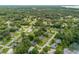 Aerial view of neighborhood by lake at 246 Angeles Rd, Debary, FL 32713