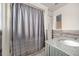 Bathroom with granite vanity and a shower/tub combo at 246 Angeles Rd, Debary, FL 32713