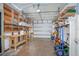 Garage with built-in shelving and workbench at 333 Beresford Ave, Deland, FL 32724
