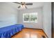 Bright bedroom with hardwood floors and a ceiling fan at 333 Beresford Ave, Deland, FL 32724