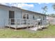 Home features a large backyard with a ramp for accessibility at 333 Beresford Ave, Deland, FL 32724