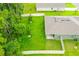 Aerial view of a fenced backyard and home at 370 Sunset Point Dr, Ormond Beach, FL 32174