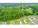 Aerial view showing a single-Gathering home's location within a community at 370 Sunset Point Dr, Ormond Beach, FL 32174