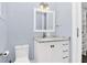 Clean bathroom with white vanity, marble countertops, and a frameless shower at 1140 S Orlando Ave # F-16, Maitland, FL 32751